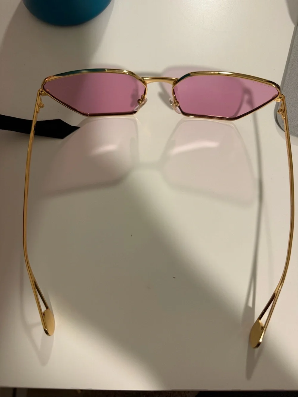Gucci Gold Frame Sunglasses with Pink Lenses